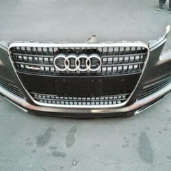 2007-2010 Audi Q7 Front Bumper With Grill And Fog Lights, Parking Assistance Sensors Oem.