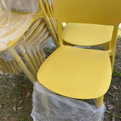 Plastic Bright yellow chairs, stackable $250 Located Mount Dora Fla 32757