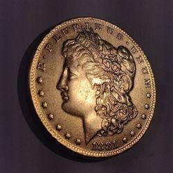 UNCIRCULATED SILV ER/22K. GOLD PLATED**ONE DOLLAR MORGAN (1881-cc) 26.7 GRAMS**38X2.9 MM.**