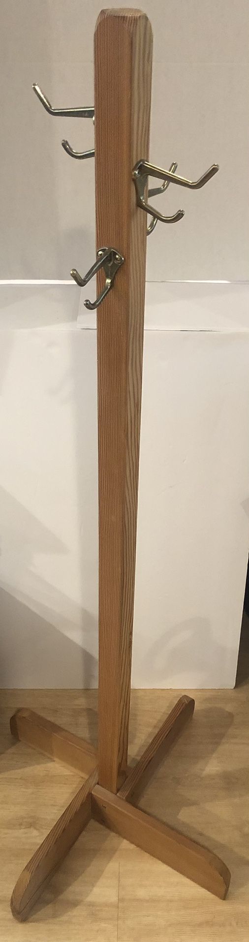 Coat Rack 4’ Wooden With Brass Colored Hooks. Works well In Children’s Room As Well As By The Door. Shorter Height Makes It Family Friendly.
