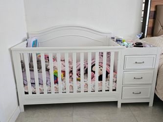 White Convertible Crib with Built-In Changing Table