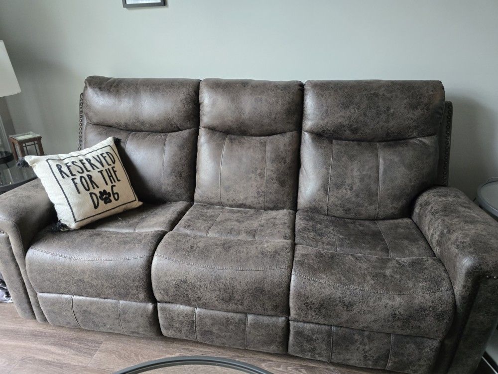 Ashley Leather Couch With Recline Ends.