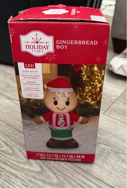 Inflatable Christmas tree and gingerbread Santa