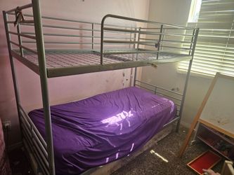 Metal bunk bed with ladder