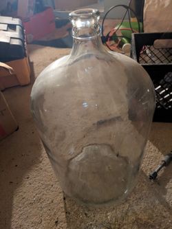 Large glass carboy water jug.