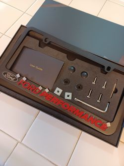 Ford Performance black license plate frame one piece. Black frame with Raised lettering. NEW