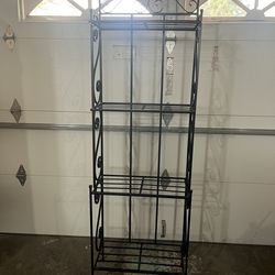 4 TIER METAL RACK . HEIGHT: 72” WIDE : 24” DEPTH: 12”