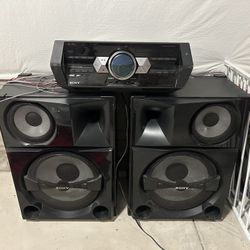 SONY STEREO AND LIGHT UP FIREPLACE STAND WITH STONE 