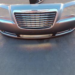2011-2014 Chrysler 300 Front Bumper With Grill And Emblem And Fog Lights With Accessories And Inner Accessories Oem. 