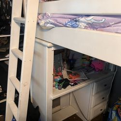 Loft Bed With A Dresser And Desk