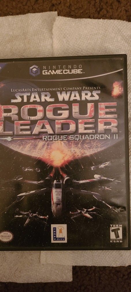 Nintendo GameCube Star Wars Rogue Leader Rogue Squadron II disk excellent, includes book. Free shipping. Teen violence.