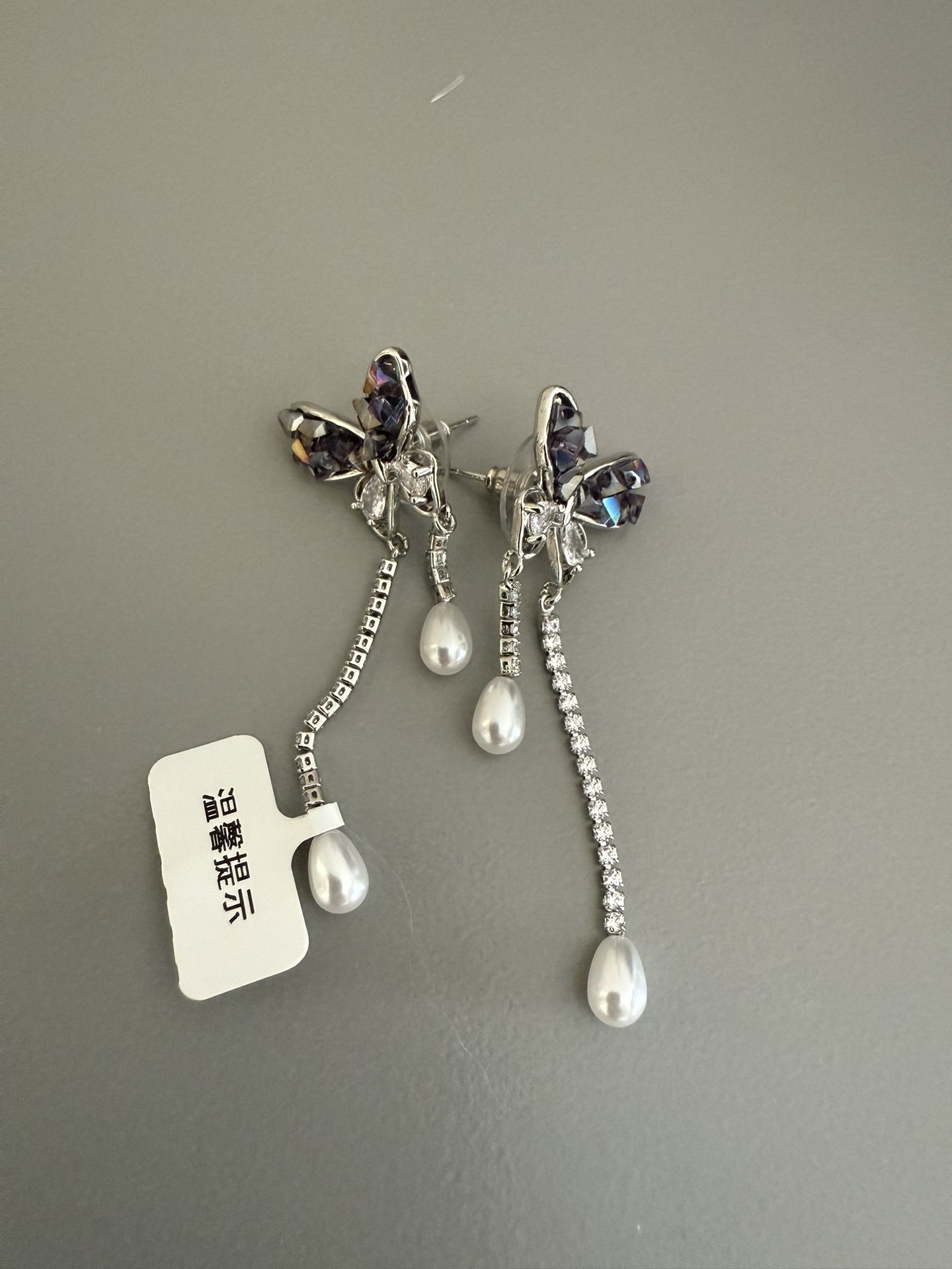 Women’s purple bow knot with pearl earrings