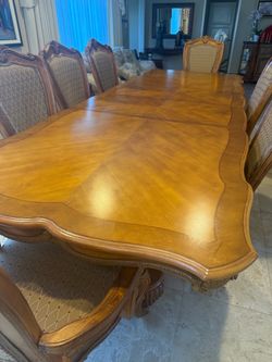 Formal wood dining table and 8 chairs set