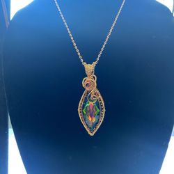 Gorgeous dragons eyes copper wire pendant.