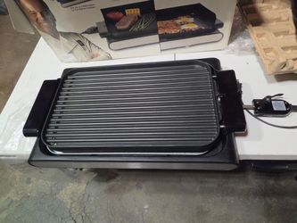 NEW IN BOX WOLFGANG PUCK IN DOOR REVERSIBLE ELECTRIC GRILL/GRIDDLE.