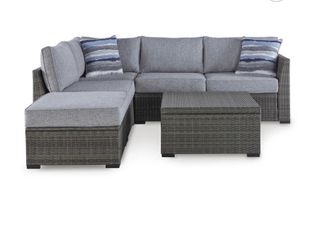 4 Piece Outdoor  Sectional, Ottoman  and Table Set BRAND NEW Ashley Furniture