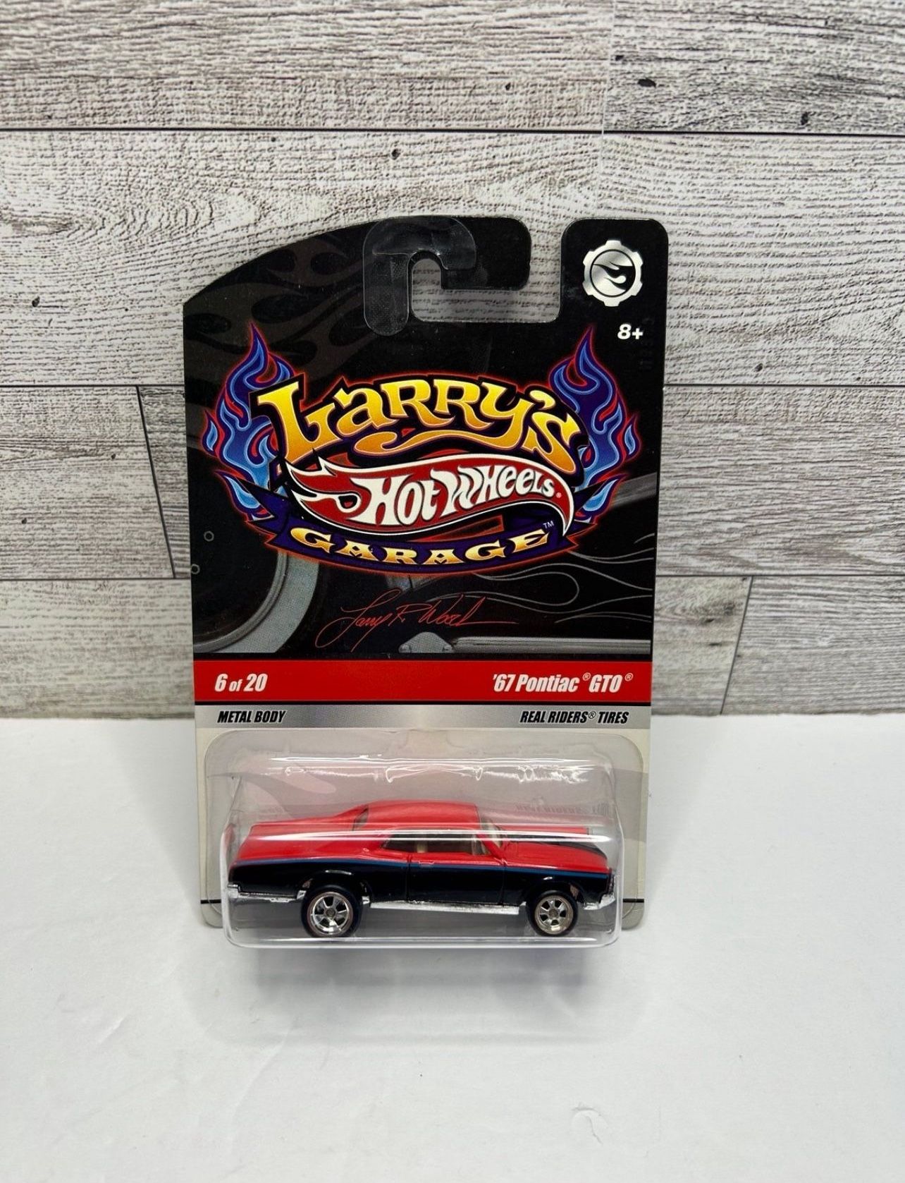 Hot Wheels Larry’s Garage Red / Black ‘1967 Pontiac / with Signature underneath • Die Cast Metal • Made in Malaysia Metal Body / Real Riders Tires