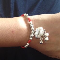 Lucky sliver bracelet with pendant ( live longer), brand new, size fits all!