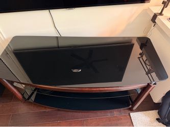 Tv /stereo bench in black glass/wood and metal