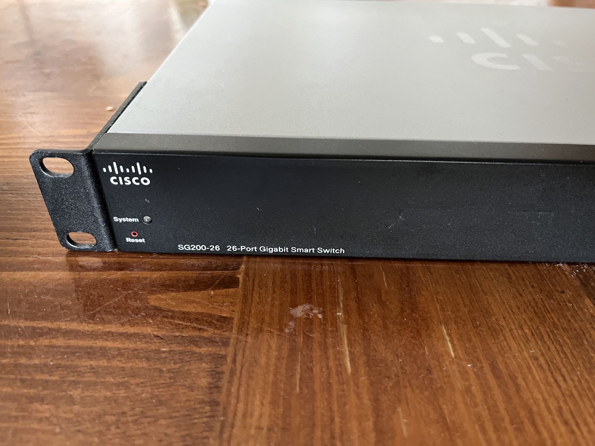 CISCO DESIGNED SG200 26 Gigabit Ethernet Smart Switch with 24 10/100/1000 Ports and 2 Combo Mini GBIC Ports (SLM2024T NA), one size