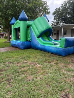 Bounce house with water slide