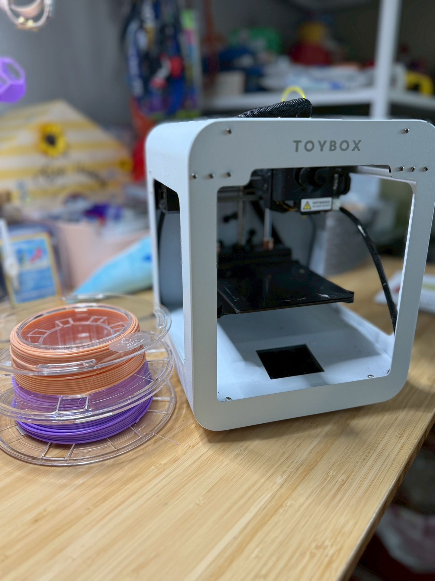 TOYBOX 3D printer. Comes with peach and grape “food” and yellow in machine