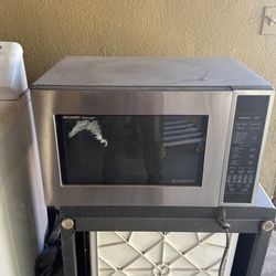 Sharp Microwave Convection measures 24 1/2 wide by 15 height