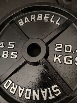 American Barbell weight plates including barbell