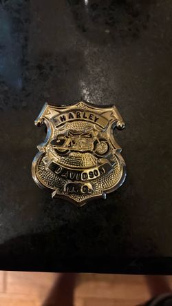 Harley-Davidson silver-tone motorcycle unit police badge vest pin.