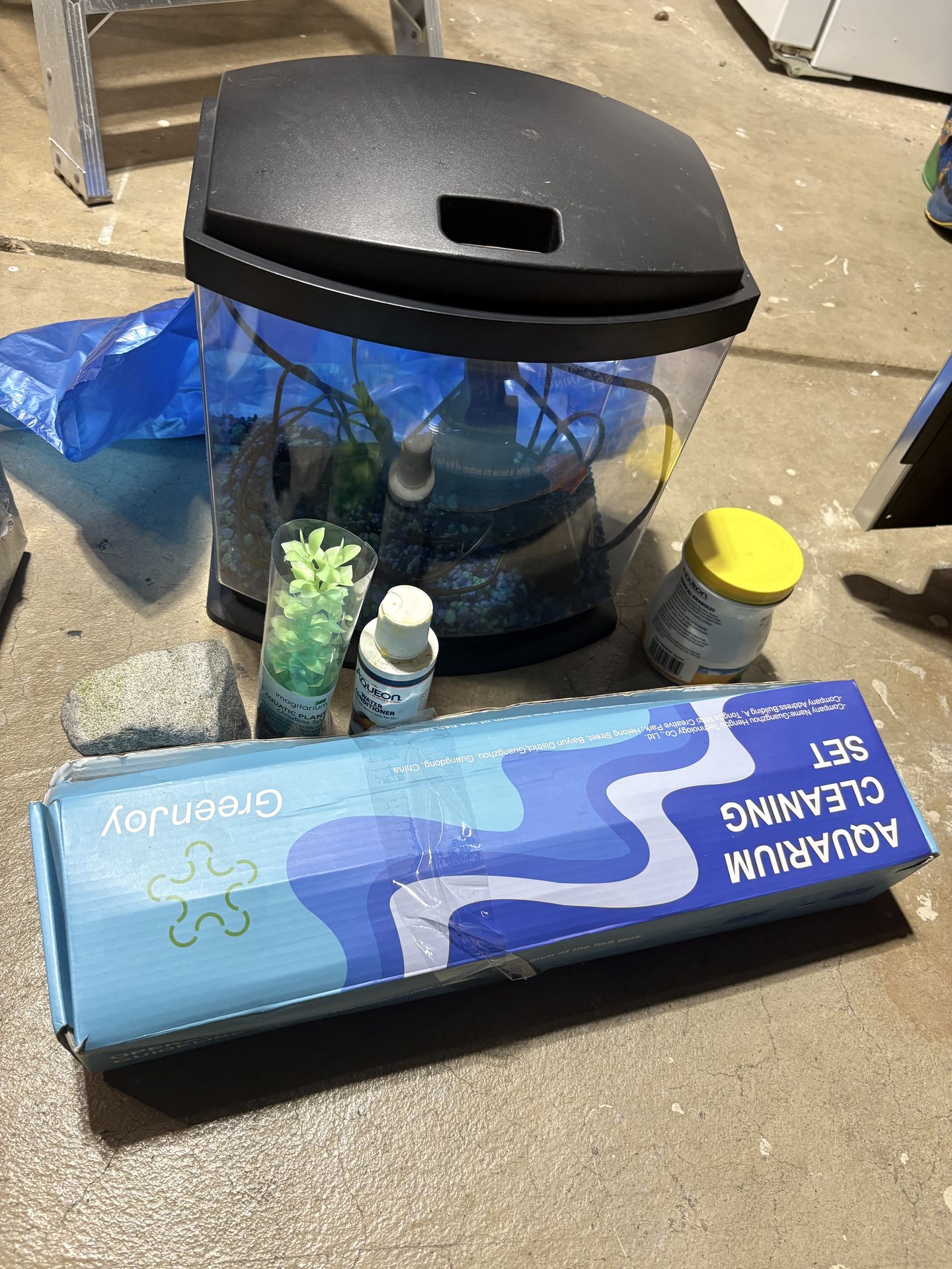 Fish tank with accessories and cleaning supplies
