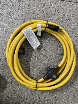 Extension cord 12/3 multi outlets 25’