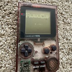 Nintendo Game Boy Pocket MGB-001 Working good with a robocop game cartridge