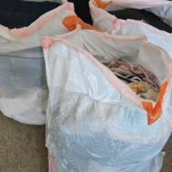 One Bag Of Male.clothings All Styles.  Sand M. SIZE ONE FEMALE. SMALL AND ONE KIDS 8TO 10 YSRS