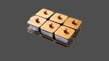 Six divided serving dishes lids, held within a metal serv