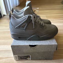 Air Jordan 4 “wet cement” size 5Y.