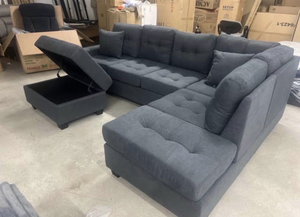 Multi colored Sectional with ottoman (STILL IN BOX NEW) 