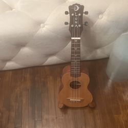 Brand New Ukelele With Stand 