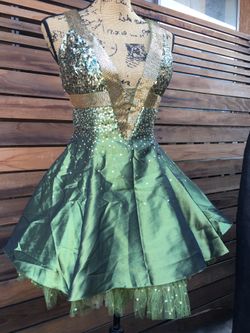 Beautiful new sexy dress perfect for prom or special events or as poison ivy Halloween 🎃 costume size 10