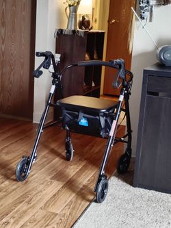 Like New Adult Walker With Seat and Storage