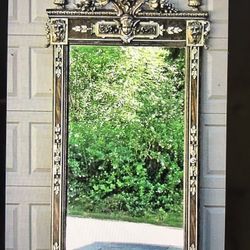 Antique 19 c Renaissance Revival style Cherub face and Twin Lion head Mirror.