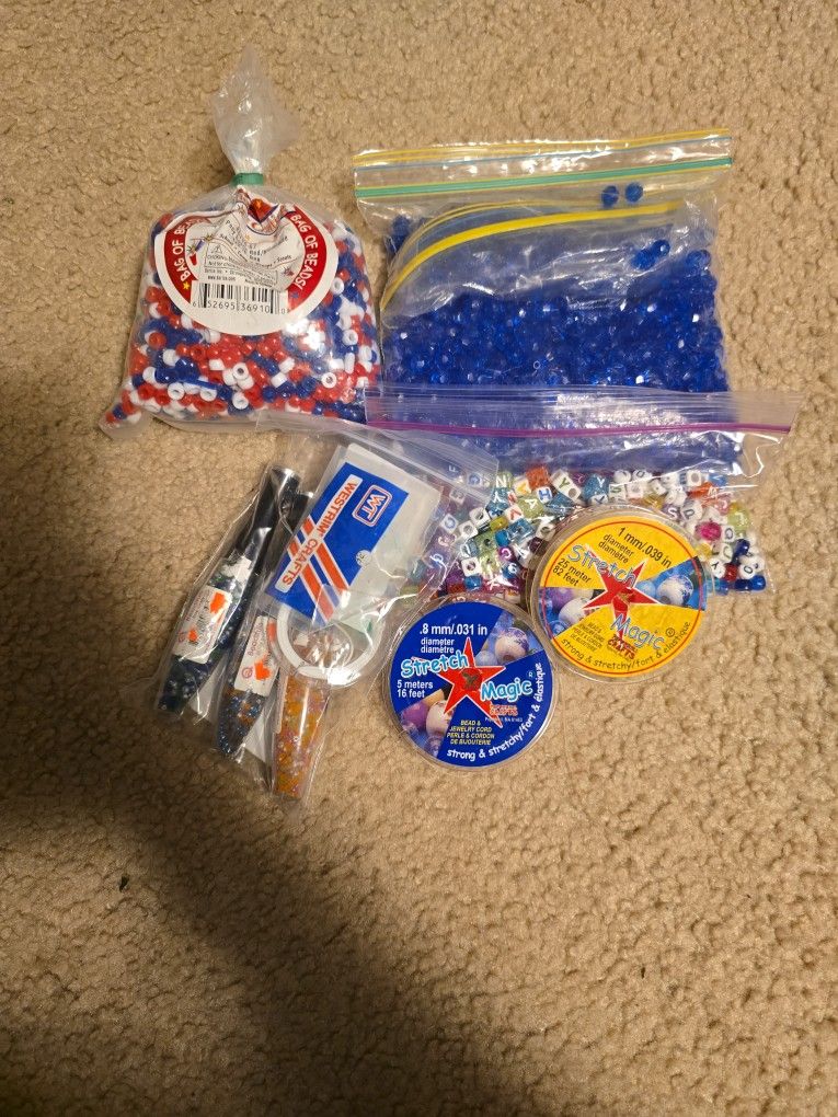 Assortment Of Beads and Elastic Cord