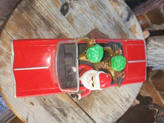 VINTAGE SANTA IN RED CAR