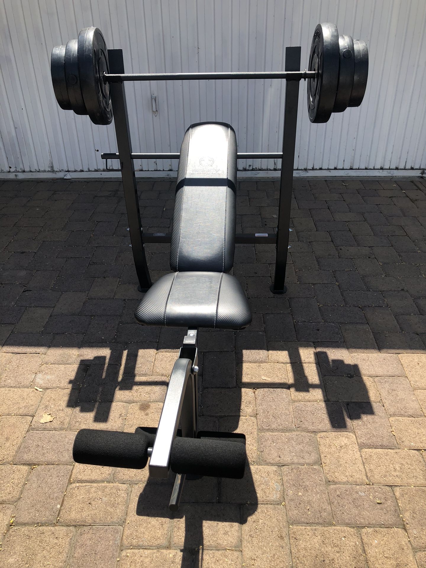 Bench press with Barbell and 100 lb Weight Set brand new all included