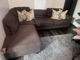 Brown couch with ottoman