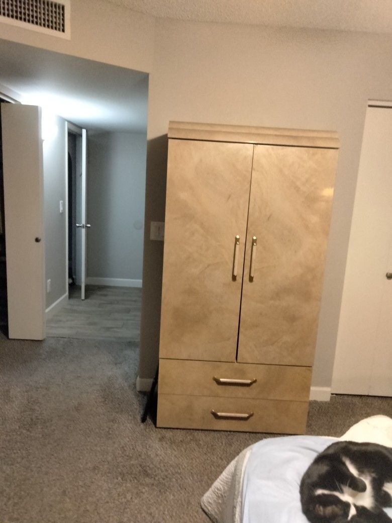 Spacious Armoire With Drawers