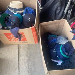 2 Boxes Of Seahawks And Mariners Hats Kraken