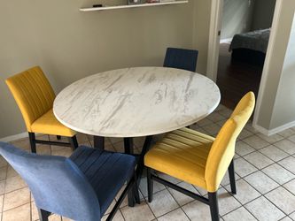 Table for sale with chairs