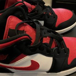 Black n Red Jordan 1 Mid grade school 7