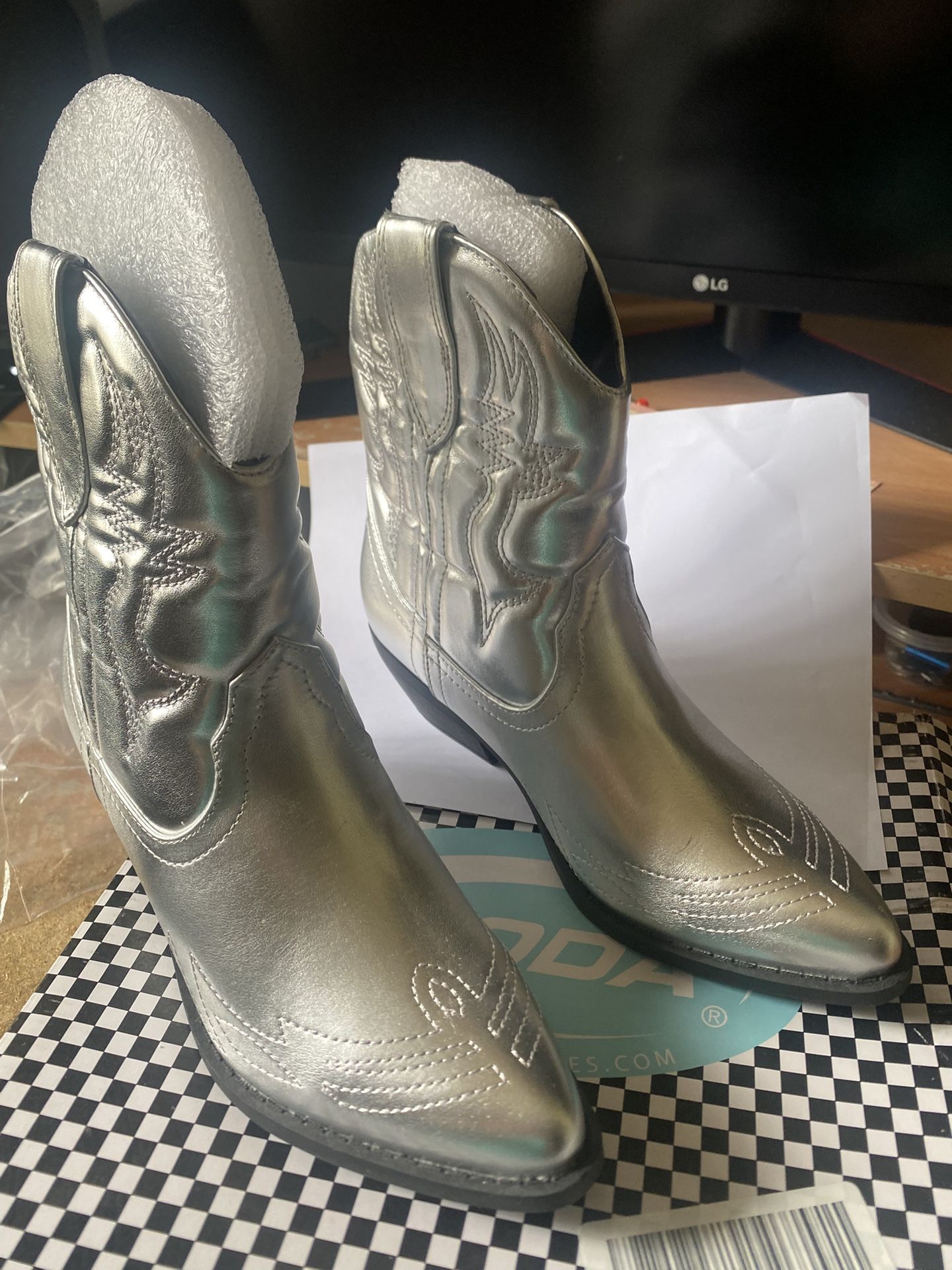 Lady’s Silver Boots