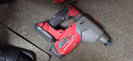 Milwaukee M18 FUEL Cordless SDS-Plus Rotary Hammer with an integrated HAMMERVAC Dust Extractor